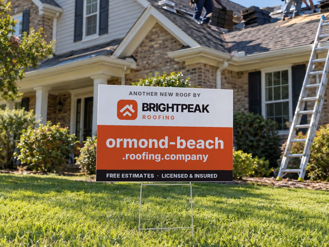 ormond-beach.roofing.company on a yard sign in front of a house getting a new roof